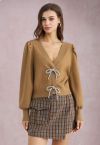 Sparkling Bowknot Buttoned Lantern Sleeve Knit Cardigan in Camel