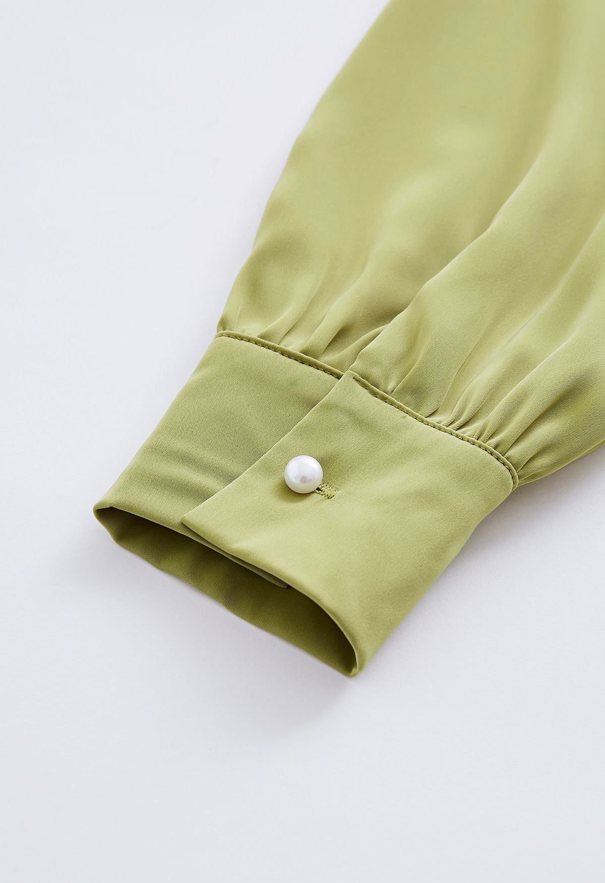 Rose Brooch Mock Neck Satin Shirt in Pistachio