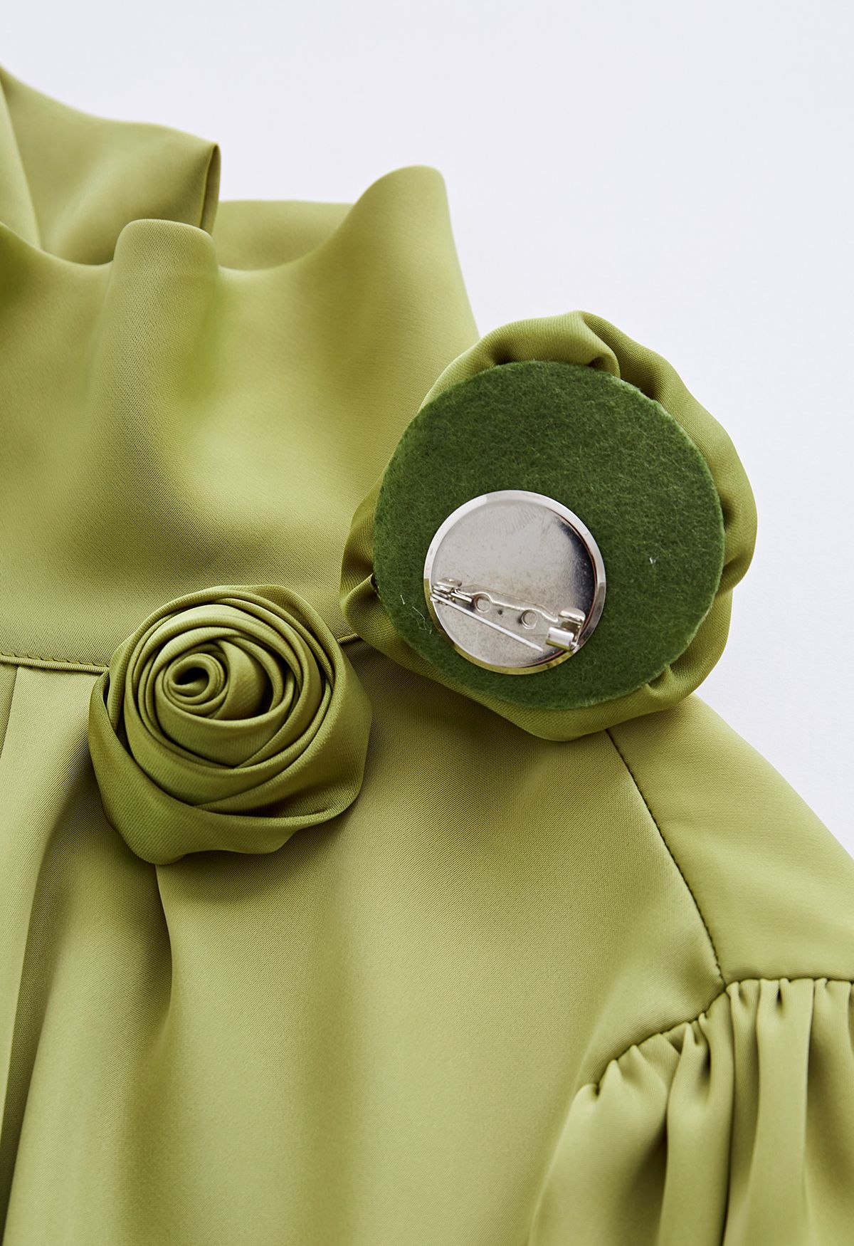 Rose Brooch Mock Neck Satin Shirt in Pistachio