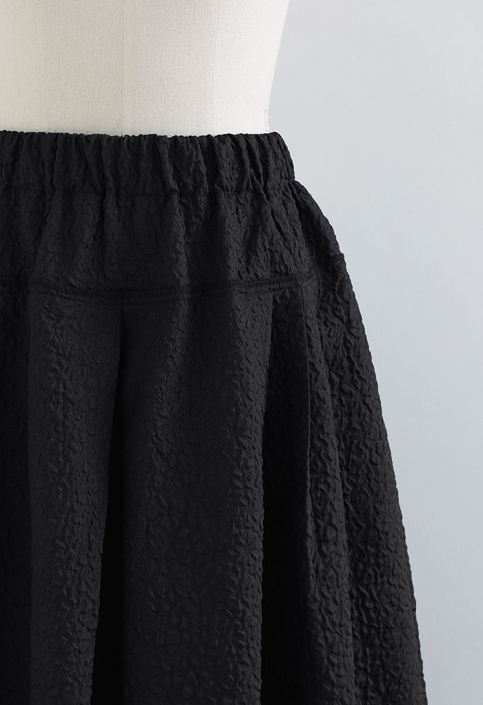 Side Pocket Pleated Embossed Midi Skirt in Black