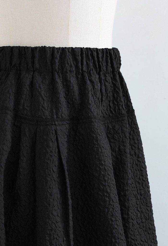 Side Pocket Pleated Embossed Midi Skirt in Black