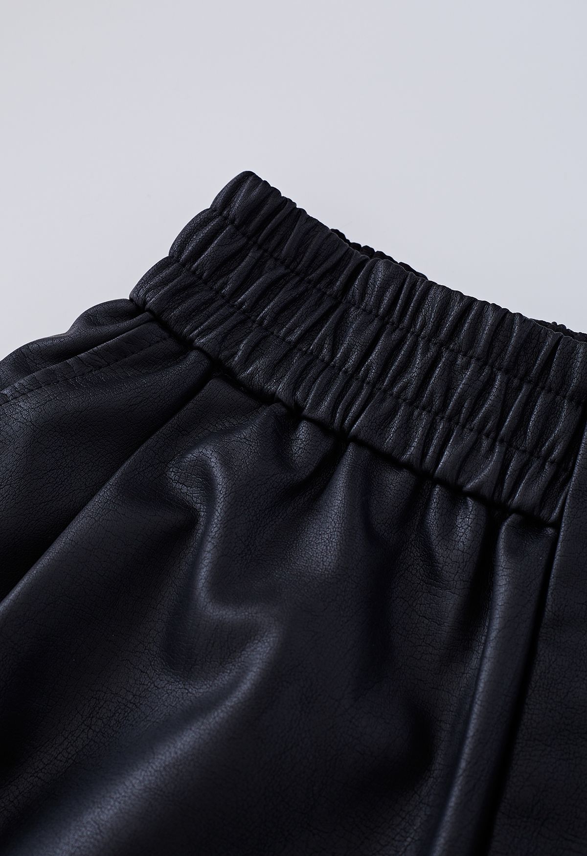 Textured Buttoned Faux Leather Shorts in Black - Retro, Indie and ...