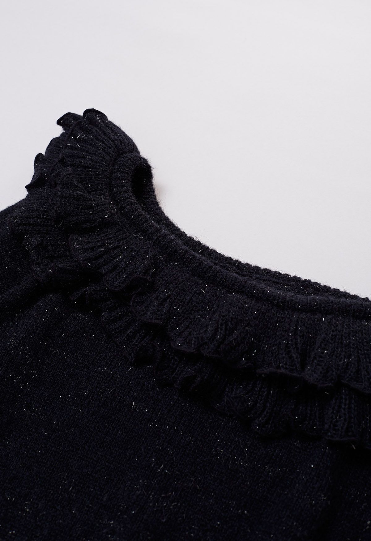 Shimmering Tiered Ruffle Off-Shoulder Knit Sweater in Black