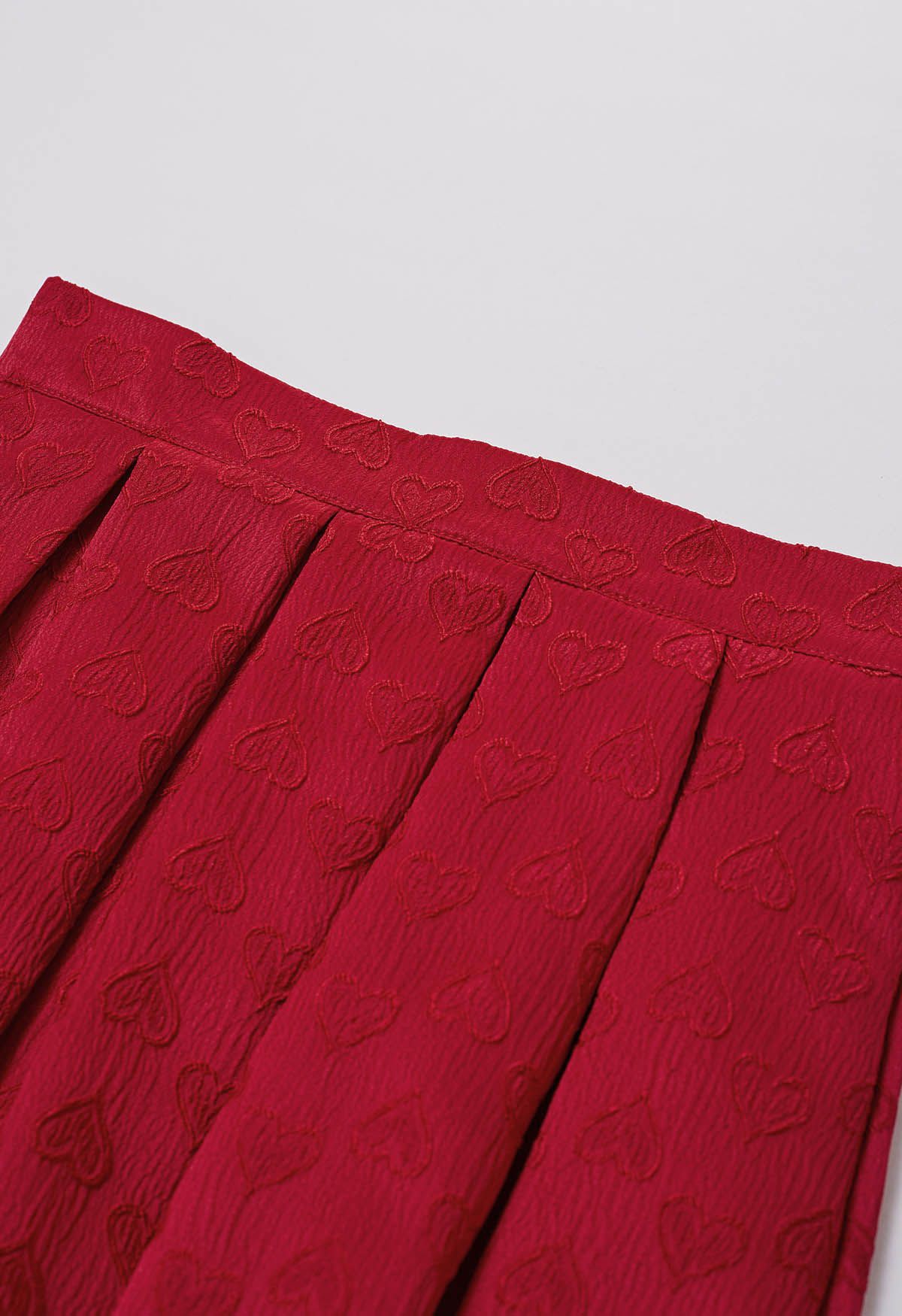 Oppositely Hearts Jacquard Pleated Midi Skirt in Red