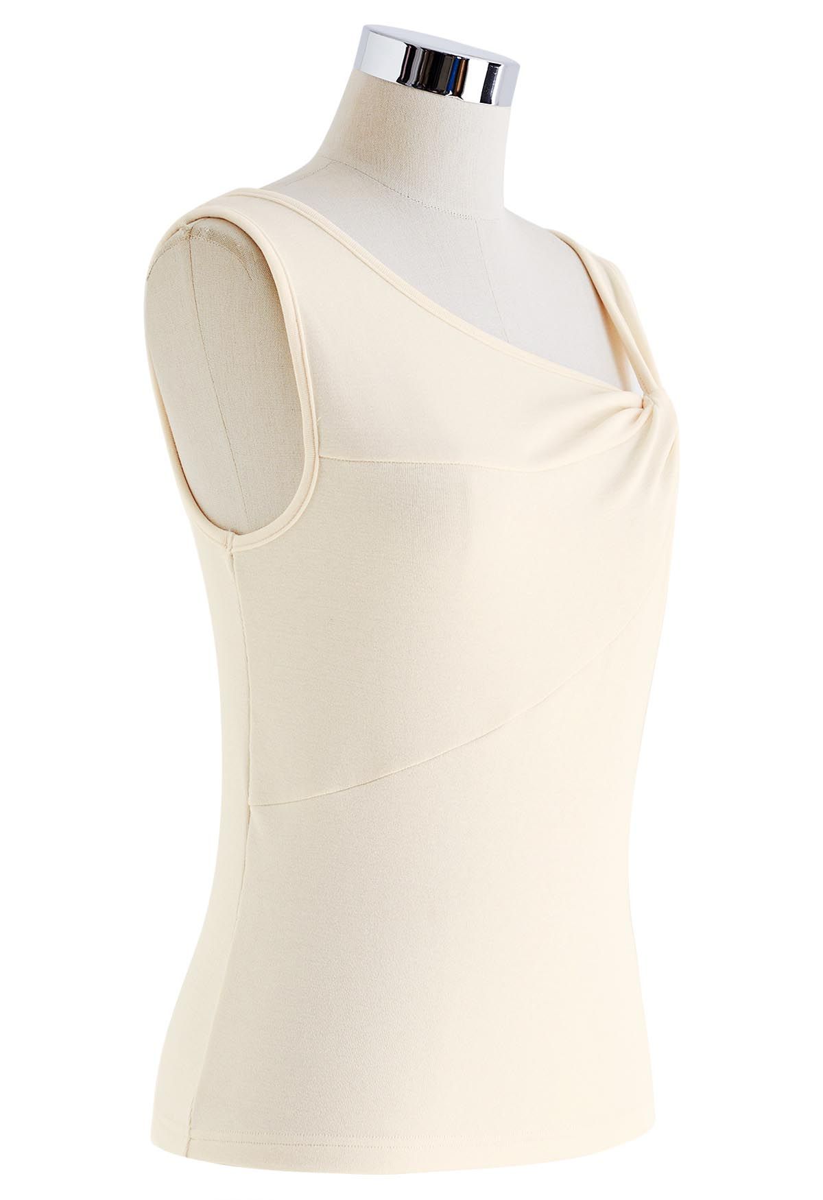 Asymmetric Twist Neckline Sleeveless Top in Cream