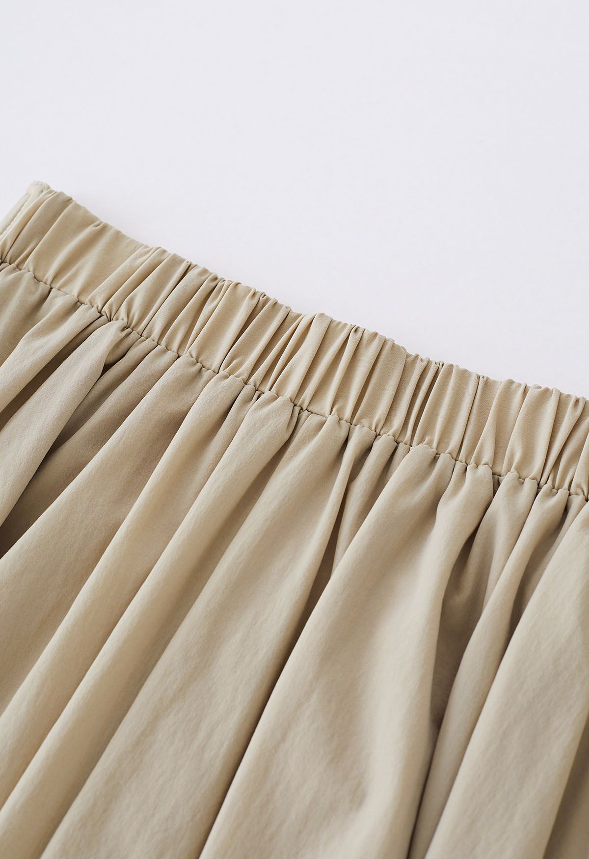 Notched Waist Flare Midi Skirt in Light Tan