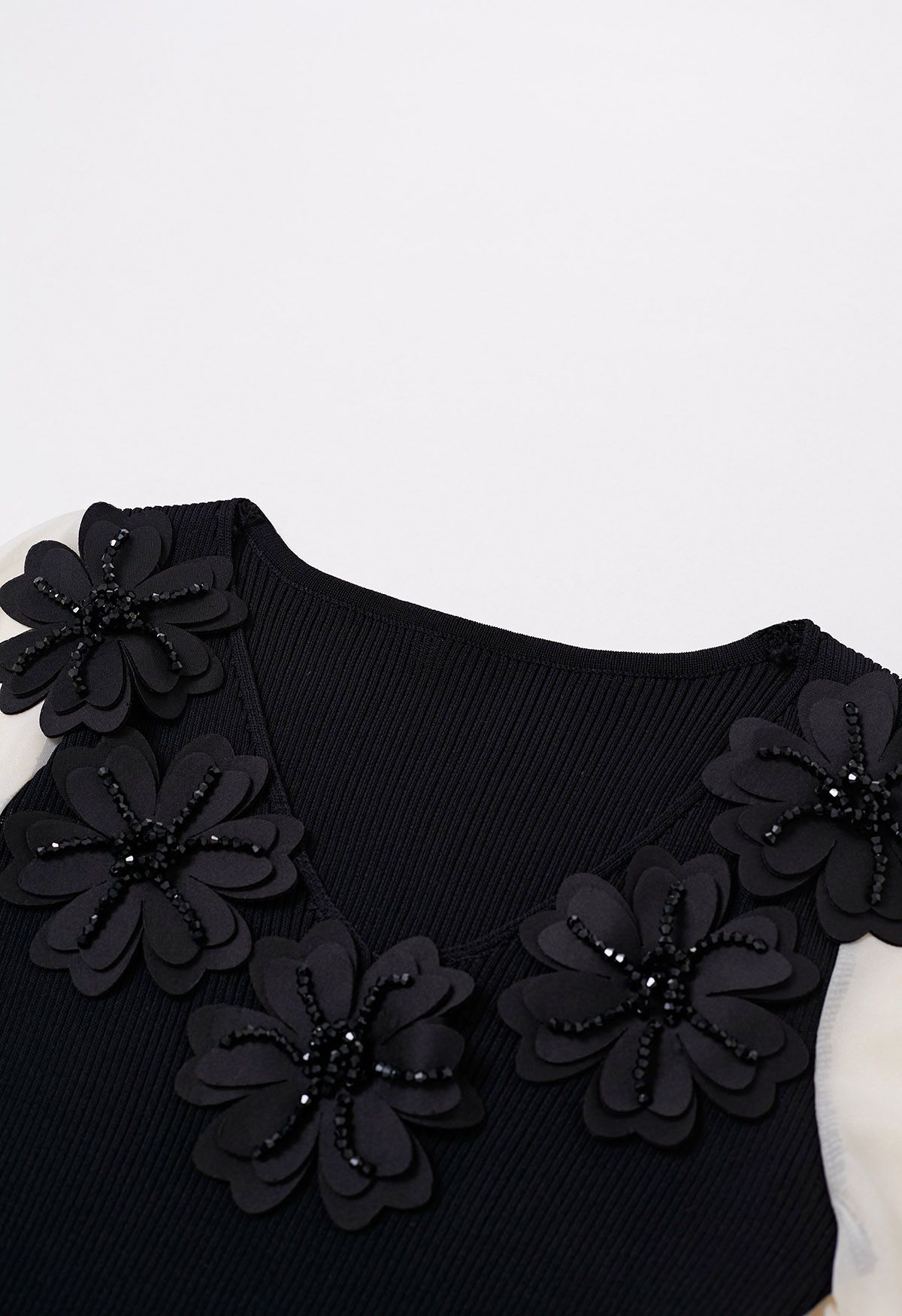 Beaded Flower V-Neck Bubble Sleeve Spliced Knit Top in Black