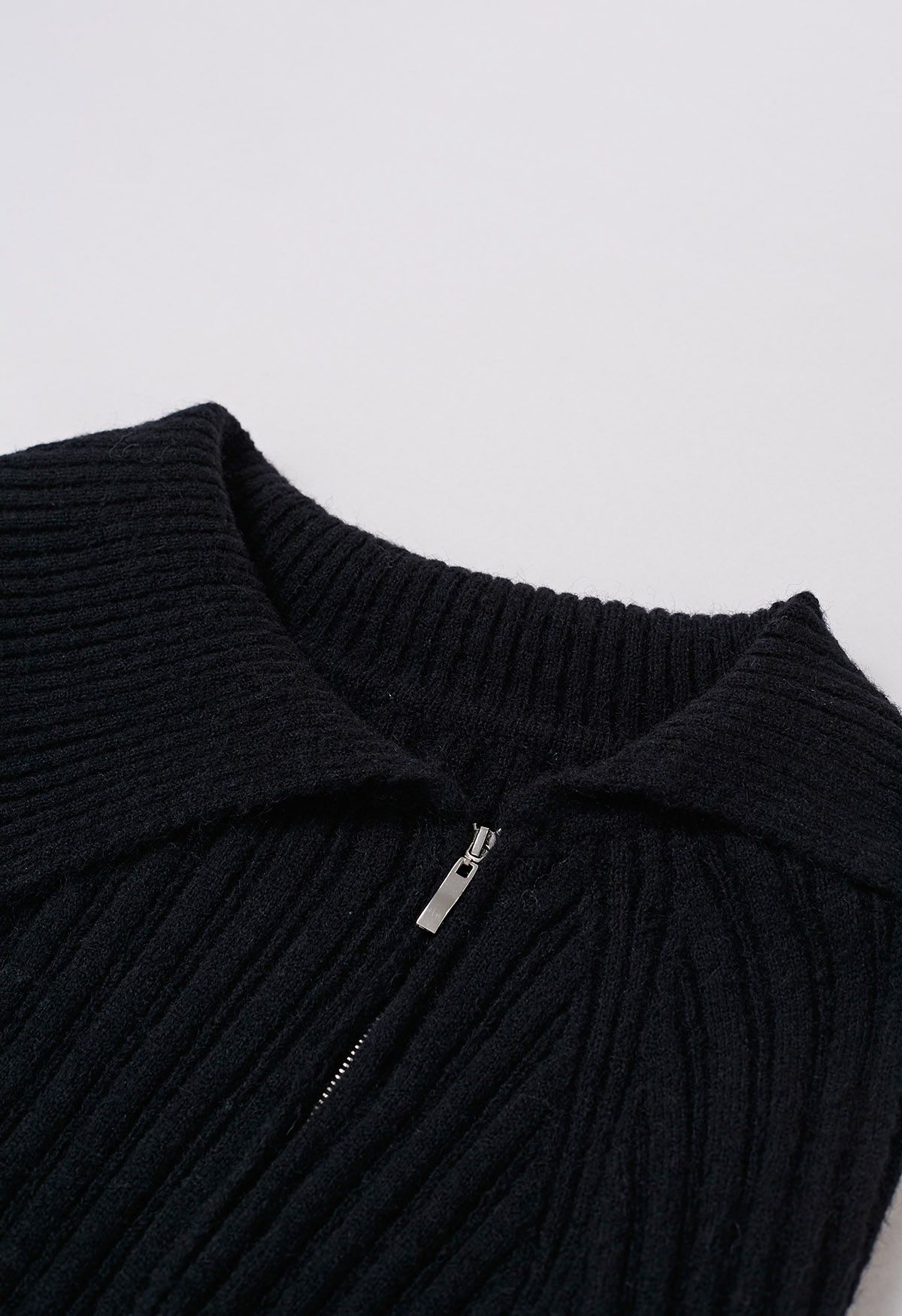 Asymmetric Flap Collar Zip Up Knit Top in Black