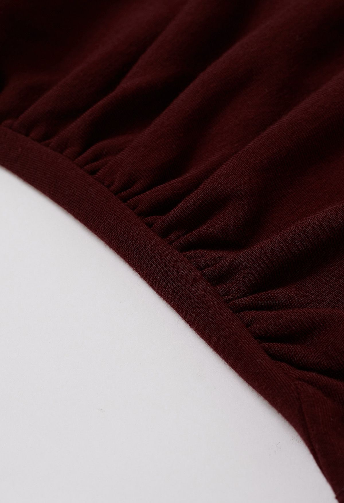 Asymmetric Neck Ruched Long Sleeve Top in Burgundy