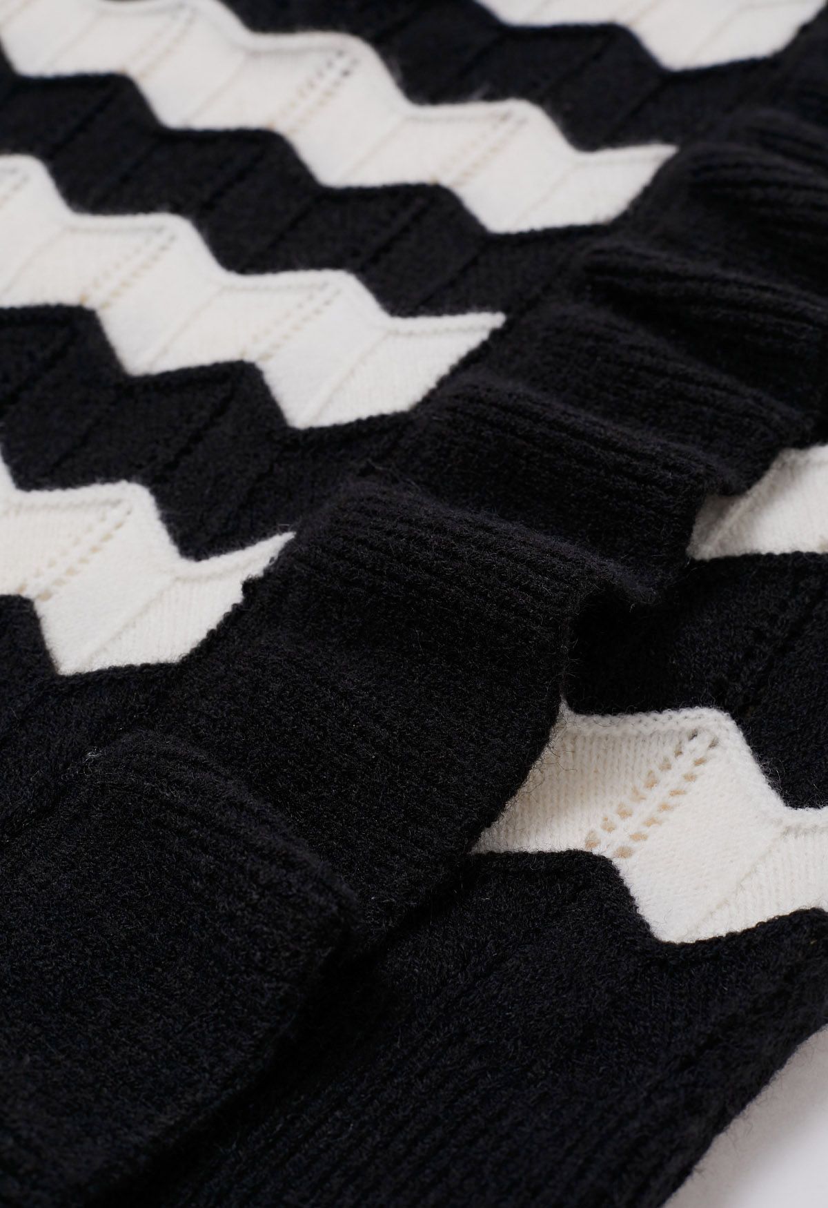 Ruffle Trim Wavy Stripe Knit Sweater in Black