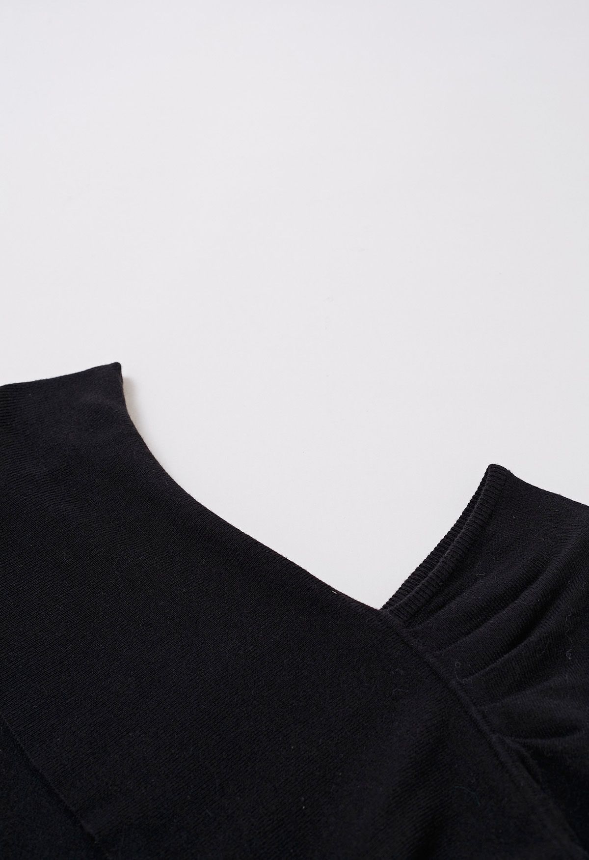 Asymmetric Folded Shoulder Knit Top in Black