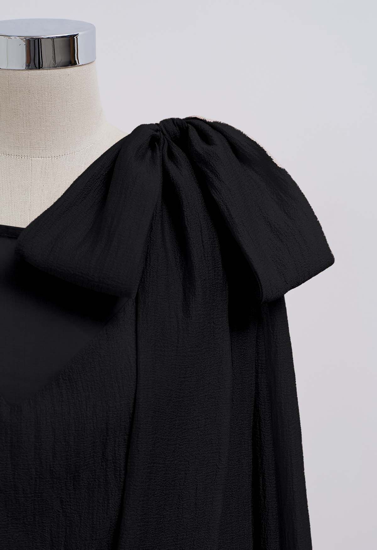 Self-Tie Side Bowknot Sheer Top in Black