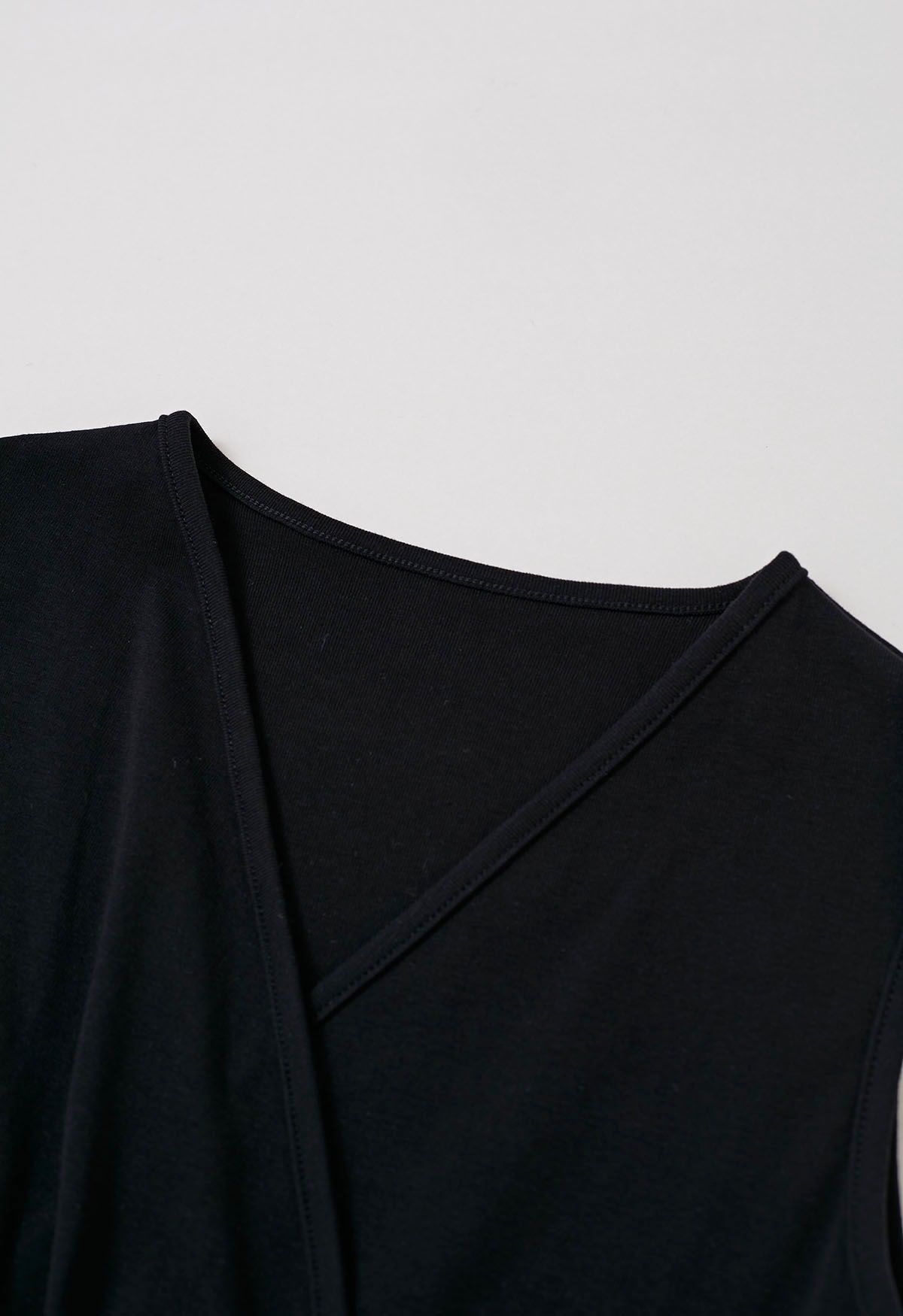 Faux-Wrap Sleeveless Cotton Top in Black