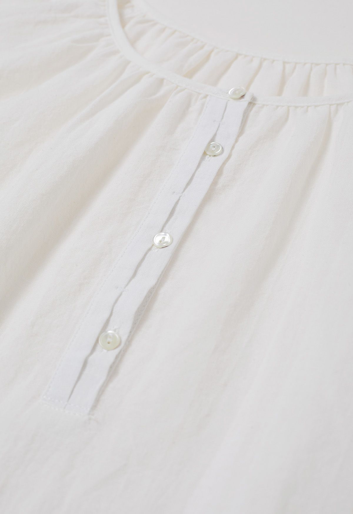 Buttoned Front Roll-Cuff Dolly Top in White