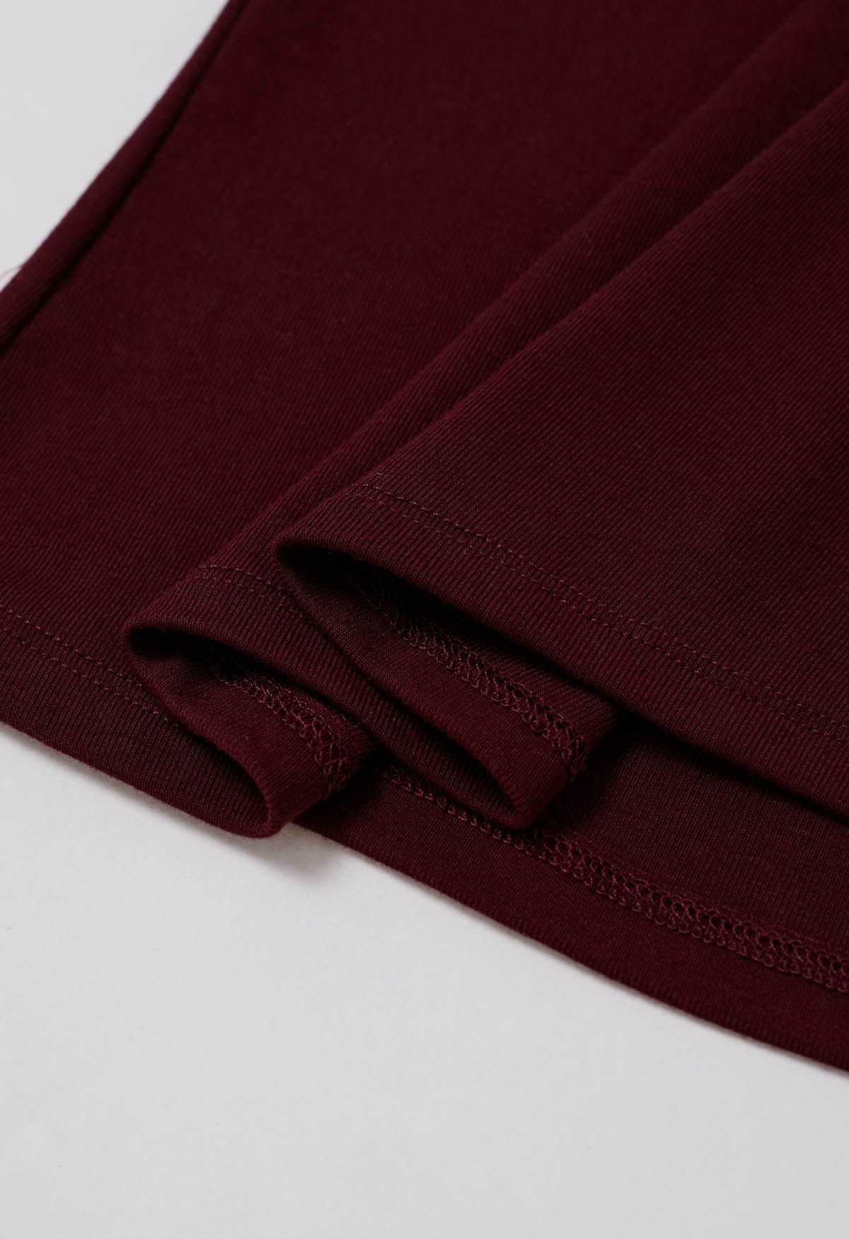 Bow-Tie Embellished Cap Sleeve Top in Burgundy