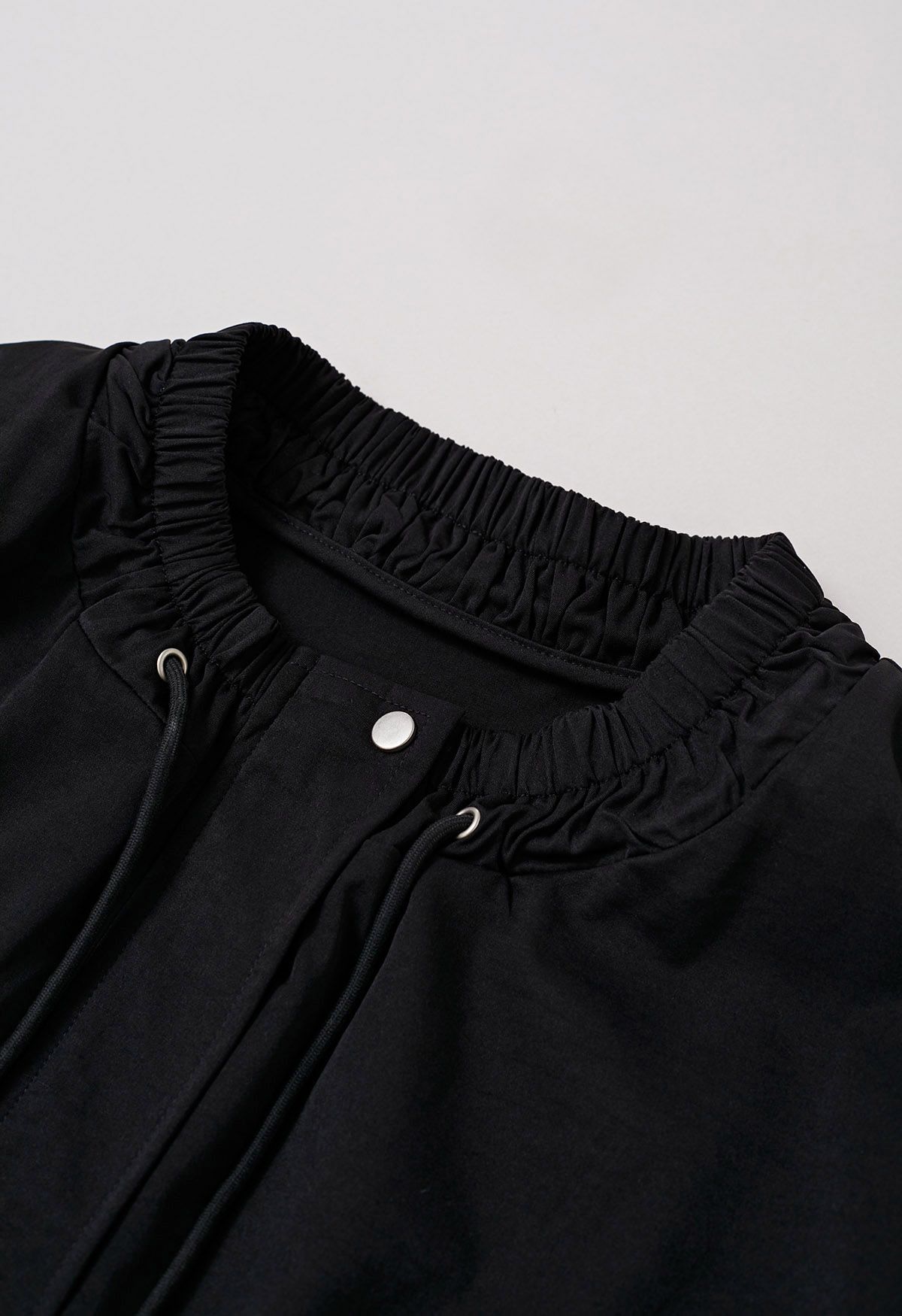 Laid-Back Side Pocket Drawstring Parka in Black