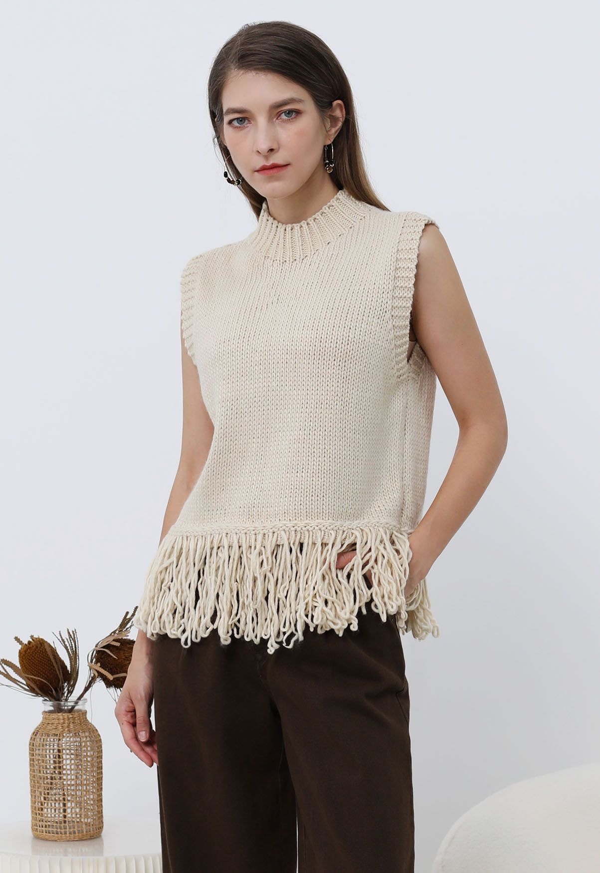 Intriguing Fringed Mock Neck Sleeveless Knit Top