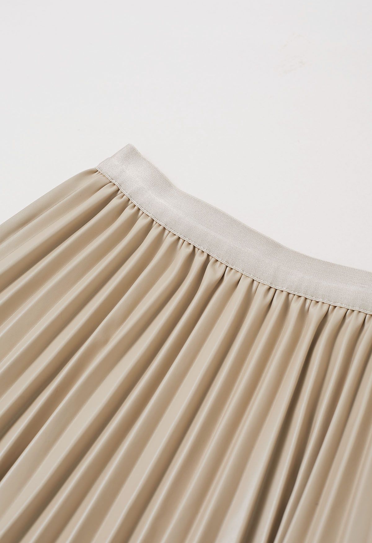 Versatile Faux Leather Pleated Midi Skirt in Sand