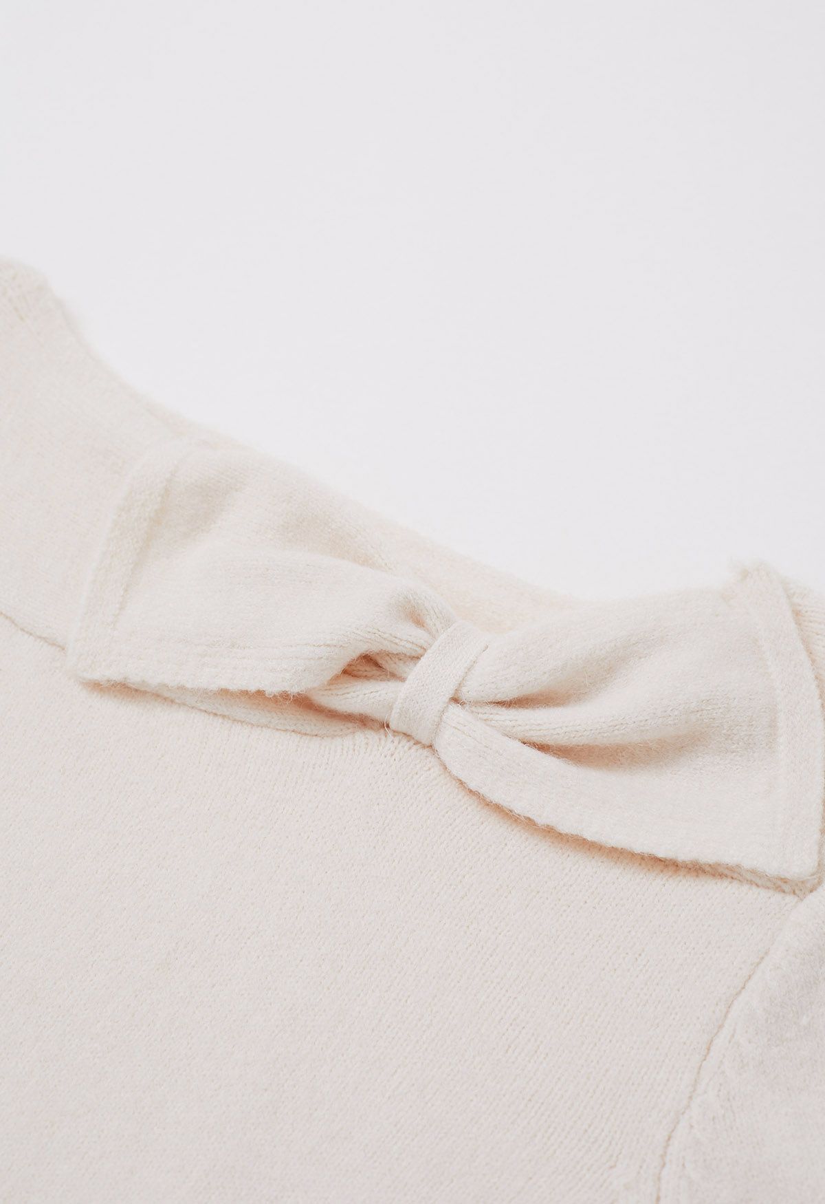 Bowknot-Trimmed Boat Neck Knit Sweater in Ivory