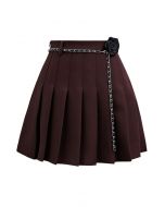 Rose Brooch Chain Belt Pleats Mini Skirt in Burgundy